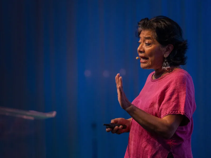 Woman giving a speech on stage